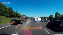 Dash cam captures caravan accident on UK road