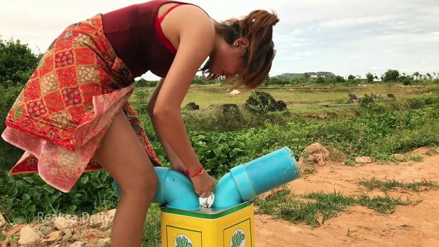 Amazing Smart Girl Using Creative Oil Container with PVC Pipe Fish Trap to Catch A lot of Fish