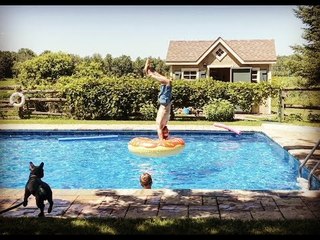 Dad Finds the Coolest Way to Jump Into an Inflatable Ring