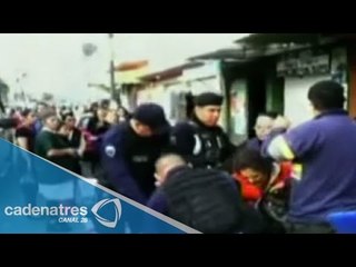 Polícias de Neza detienen a vendedora ambulante