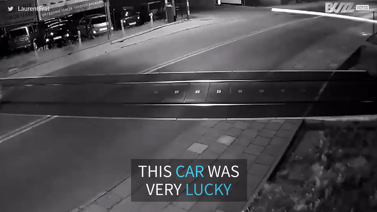 Car miraculously escapes from being hit by a train in Poland