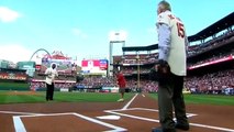 Bob Gibson throws out the first pitch to Tim McCarver