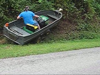 Cutting grass and doing wheelies with boat