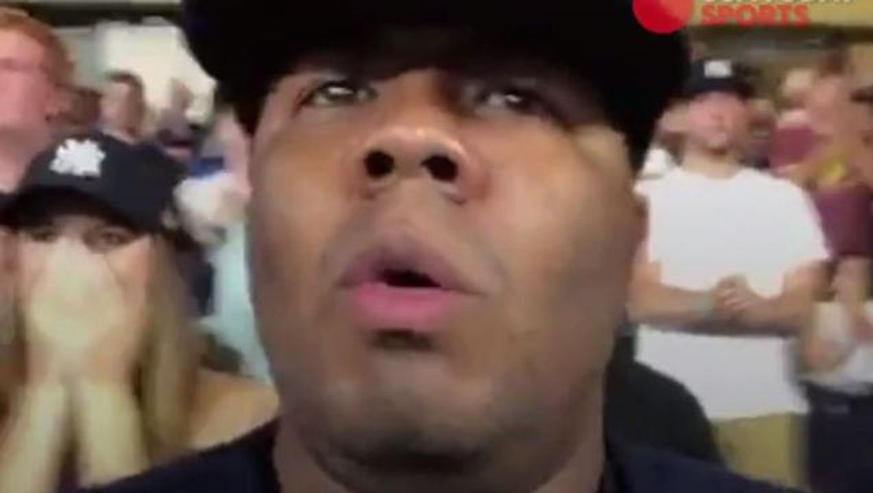 Shocked Yankees fan watches his team blow a lead against the Red Sox