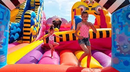 Jumping on Giant Minions Bouncy Castle- Fun Activities for Kids!