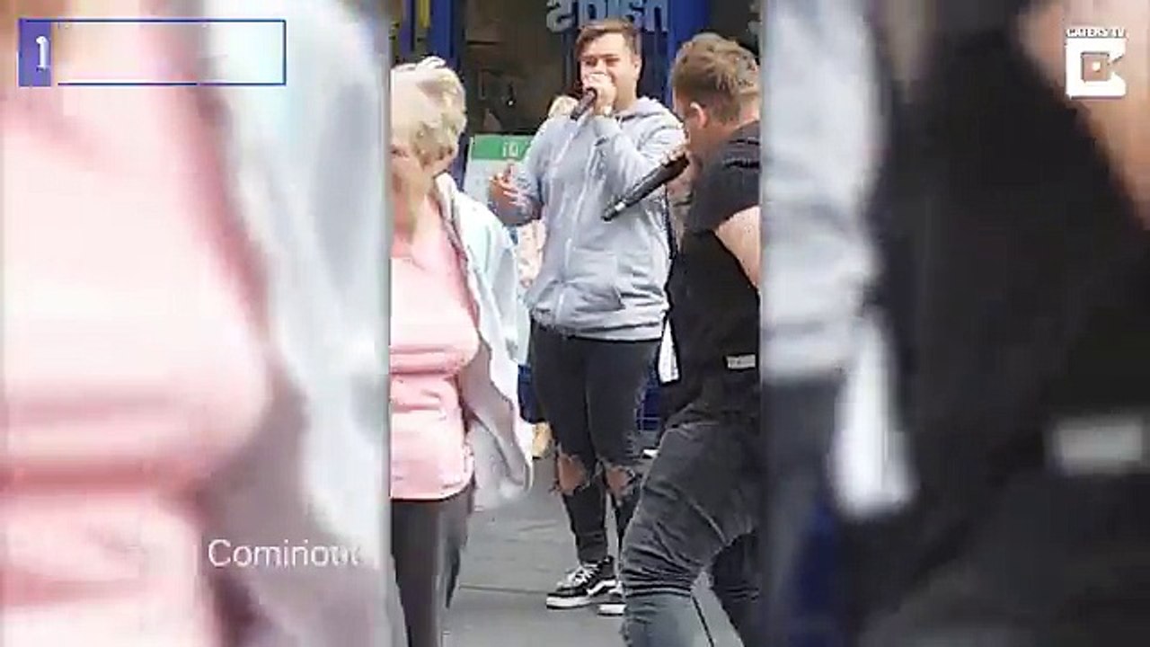 Gran beat boxes with buskers on the street in Leicester