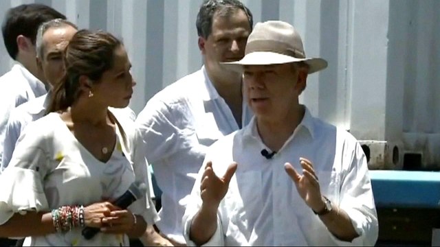 Colombia declares peace with FARC as weapons handed over