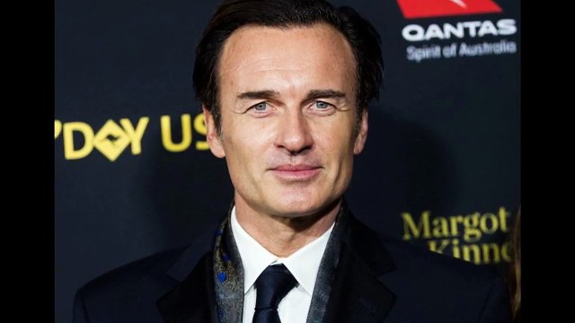 Get a room you two! Julian McMahon and wife Kelly Paniagua are STILL loved up at the GDay