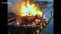 Lorry bursts into flames on road