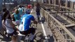 Cyclist sings to clear Brooklyn Bridge bike lane