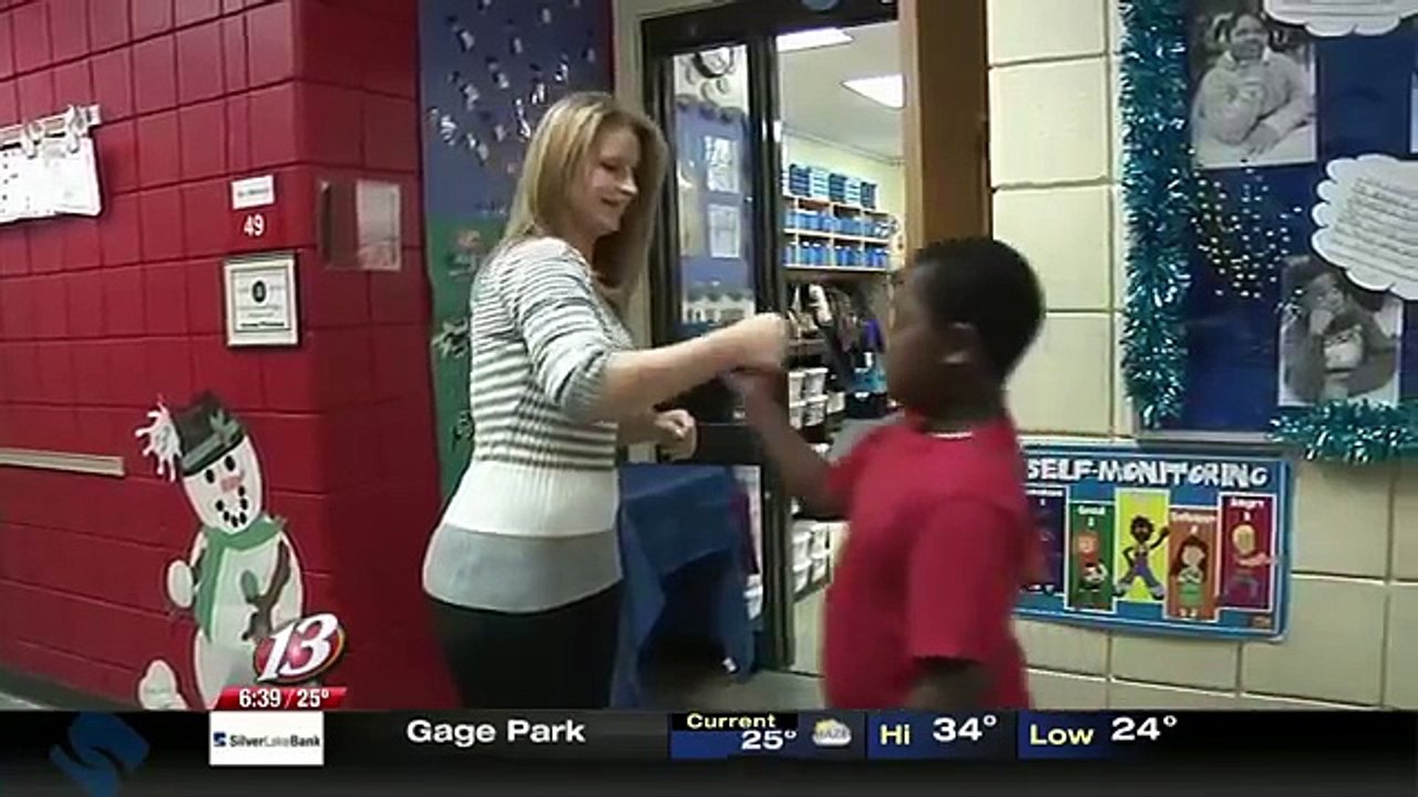 Wichita area teacher uses special handshakes to connect with students