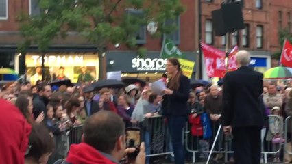 Corbyn Holds Umbrella For Labour MP