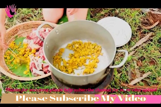 Beautiful girl cooking village food factory in Cambodia