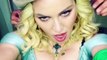 Madonna Strikes A Sultry Pose In Front Of An Altar