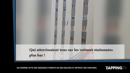 Download Video: De son balcon, un homme jette des dizaines d'objets et détruit les voitures plus bas (vidéo)