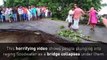 People plunge into floodwater as bridge collapses in India
