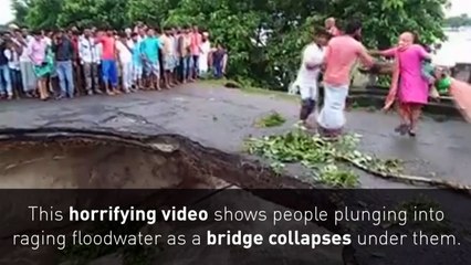People plunge into floodwater as bridge collapses in India
