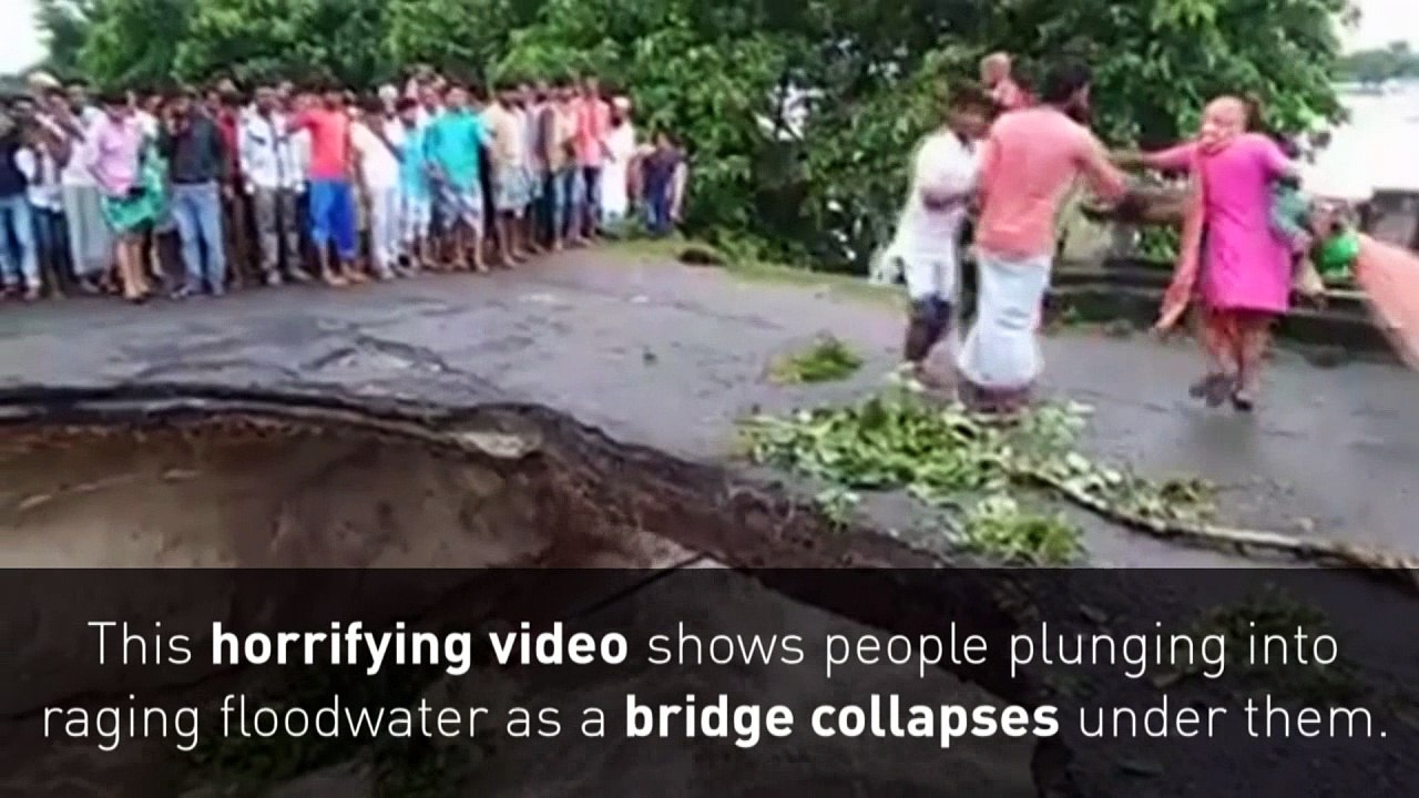 People plunge into floodwater as bridge collapses in India