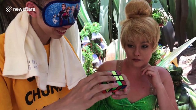 Man solves Rubik's cube blindfolded for a Disney fairy