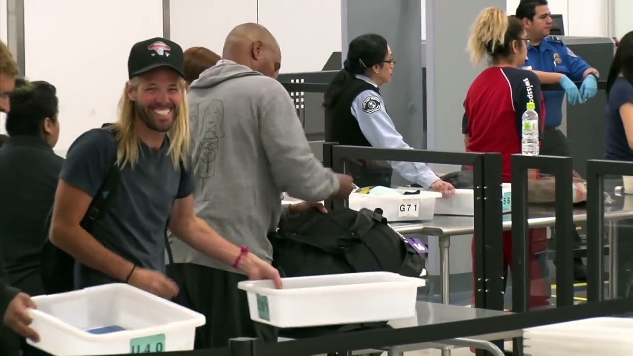 Foo Fighters Drummer Taylor Hawkins Handles Enhanced Pat Down By LAX TSA Like A Champ