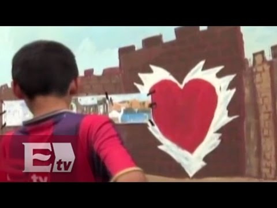 Niños llenan de color los muros de la cárcel de Sadam Husein / Vianey Esquinca