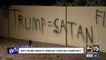 Spray painted wall in Phoenix reads "Trump = Satan"