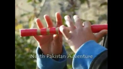 Youngest Boy Playing Flute In Hunza Valley