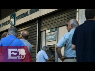 Reabren los bancos en Grecia / Titulares de la Noche