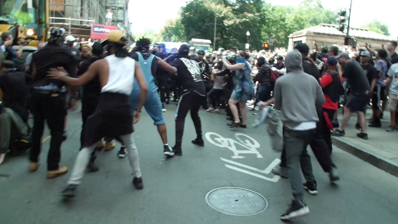 Counterprotesters and police scuffle after 'free speech' rally