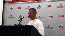 Urban Meyer trying to get the Cleveland Indians score from the media