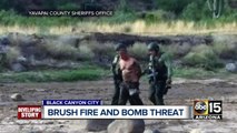 Man in custody after bomb threat, brush fire in Black Canyon City