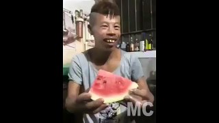 Funny man eat watermelon