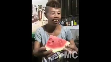 Funny man eat watermelon