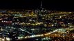 Landing in Dubai at Night with view of the Burj Khalifa