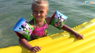 Bad Baby with Inflatable Сolored Mattresses on the water Family Fun Playtime Activity