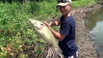 Nine Year Old Boy Bow Fishing River Monsters!