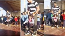 Professor arranja forma genial de ajudar menina paraplégica a dançar na escola
