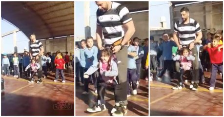 Professor arranja forma genial de ajudar menina paraplégica a dançar na escola