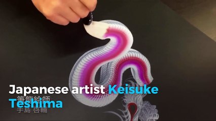 Japanese artist paints detailed dragon with single stroke