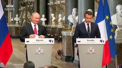France's Macron holds 'frank exchange' with Putin - BBC News