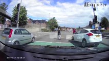 Shocking Moment Pedestrians Are Almost Mowed Down At A Crossing