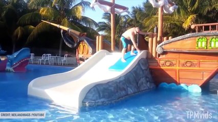 kid falls off water slide..
