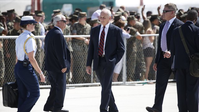 Kelly kisses baby at Marine meet-and-greet