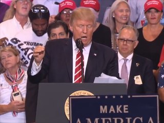 RAW: Crowd shouts "U-S-A" at Trump speech protester