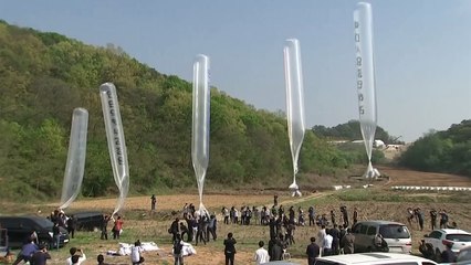 South Koreans sending balloons across to North Korea