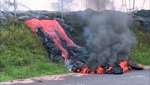HYPNOTIC Video Volcano Eruption Lava Flows Drips to the Ocean Water and Burns Cottage House Viral
