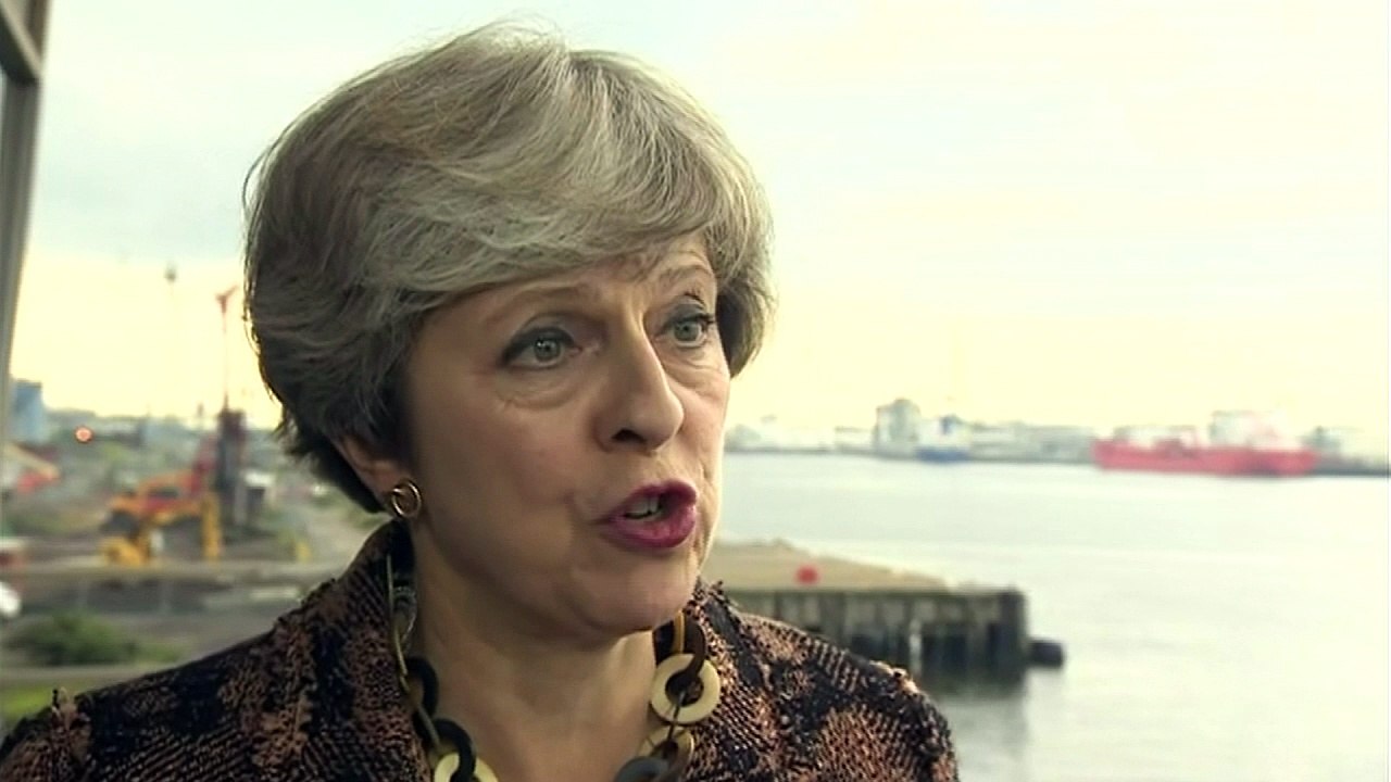 May says deportation letters were an 'unfortunate error'