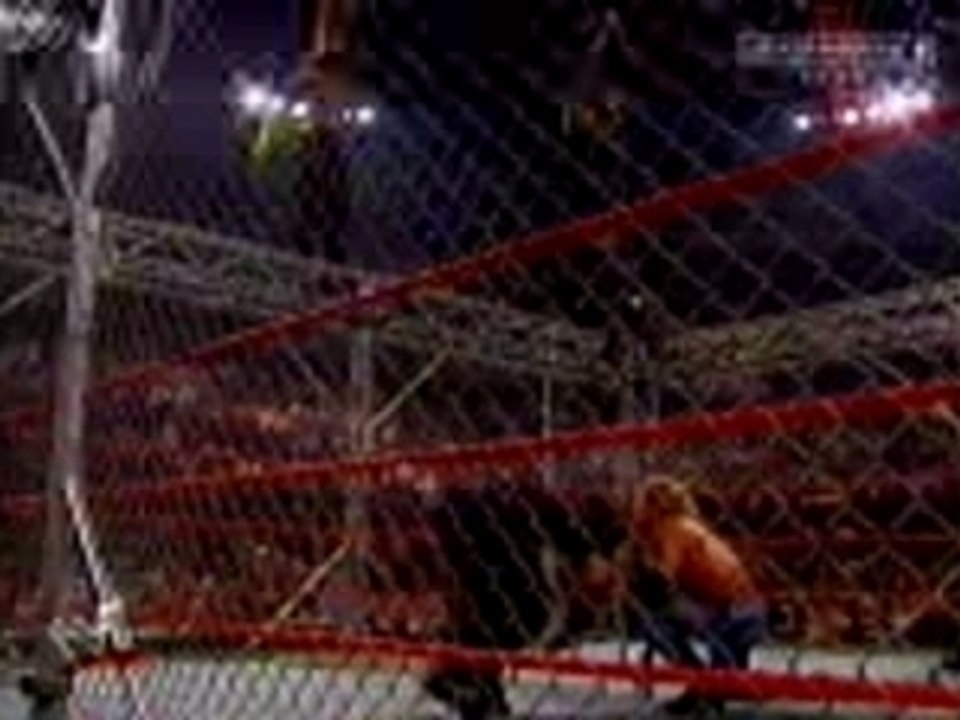 Wwe - jeff hardy does a dragon attack off the cage