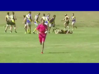 Shocking moment an amature footy player kicks opponent in the head
