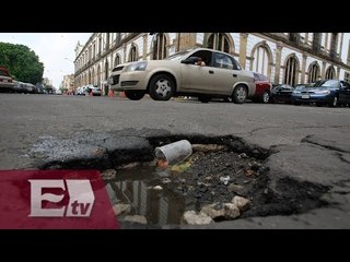 GDF indemniza a automovilistas por daños causados al vehículo por baches/ Mariana H